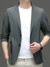 Men’s long sleeve blazer in sleek dark gray with modern cut and subtle texture for formal and business wear