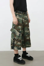 Mens camouflage denim cargo cropped pants on model
