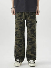 Men’s loose fit jeans in green and black camouflage with multiple cargo pockets for casual outdoor wear