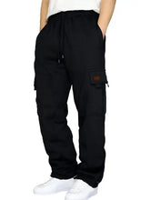 Mens black cargo drawstring pants with side pockets in charcoal gray blue black