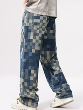 Men’s checkered wide leg jeans in denim with bold pixelated checkered pattern in shades of blue and gray