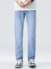 Light-wash denim men’s classic straight fit jeans with a straight-leg cut and subtle fading
