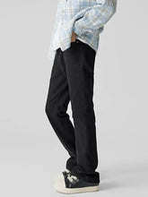 Men’s classic straight fit jeans in black smooth durable fabric with subtle creases and a modern straight fit cut