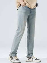 Men’s classic straight fit jeans in light-wash denim with slim fit and subtle thigh fading straight fit jeans
