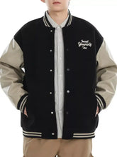 Men contrast snap varsity jacket in black and beige with embroidered invest yourself inc on left chest