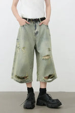 Mens distressed loose denim shorts with black belt