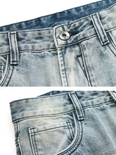 Men’s distressed vintage wash light-wash denim jeans with faded texture and dark blue inner waistband loose fit