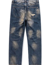 Mens distressed wash relaxed fit wide leg dark blue denim jeans showing back side with faded patches and ripped pocket