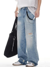 Men’s light-wash denim wide leg jeans with distressed ripped details for a stylish casual look