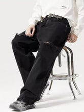 Black distressed denim men’s wide leg jeans with reinforced stitching and a wide leg cut