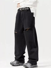 Men’s black distressed wide leg jeans with ripped knees made from denim perfect for casual wear