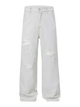 Men’s white distressed denim jeans with a relaxed fit and wide-leg cut for a casual stylish look