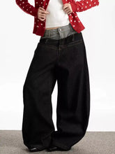 Men’s black wide leg jeans with double high waist and visible stitching details in denim material