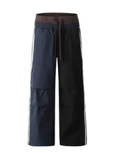 Mens two-tone cargo track pants with elastic waist and white stripes