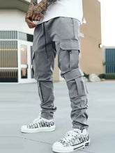 Mens drawstring gray cargo pants with pockets and white sneakers
