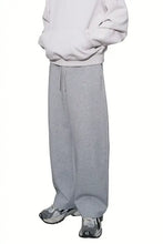 Mens drawstring basic style gray oversized hoodie and sweatpants with sneakers