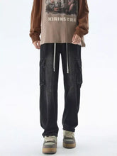 Men’s black cargo wide leg pants with multiple pockets and white drawstrings in drawstring wash wide style