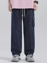 Men’s dark blue denim wide leg jeans with relaxed fit and white drawstring for adjustable comfort