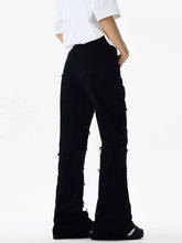 Black distressed wide-leg cargo pants with frayed hem flare jeans and multiple pockets for men