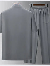 Men’s full size gray button up short sleeve shirt and matching pants set made of smooth fabric with relaxed fit