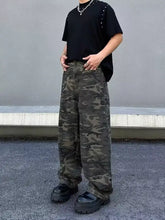 Men’s full size camo print loose fit jeans in muted green and brown durable denim for a perfect fit and relaxed style