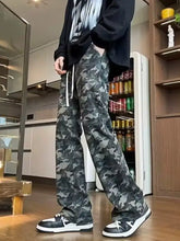Men’s full size camo print relaxed fit jeans in dark green and gray with white drawstrings made of premium cotton