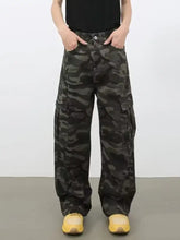 Men’s full size camo print wide leg cargo jeans in dark green and black with multiple pockets for utility use