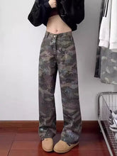 Men’s full size camouflage wide leg jeans in faded green and gray with star-patterned design and wide leg fit