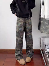 Men’s full size camouflage wide leg jeans featuring earthy green brown and blue starfish prints on denim fabric