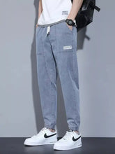 Men’s light blue denim casual drawstring jeans with elastic cuffs full size plus size joggers