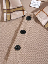 Beige textured men’s full size classic polo shirt with plaid collar and black buttons slightly stretchy machine wash cold