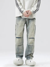 Men’s full size distressed cargo jeans in light wash denim with distressed knee patches and large side pockets