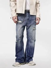 Men’s full size distressed loose fit jeans in blue denim with faded wash and ripped details plus size design
