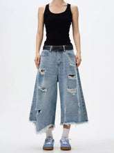 Men’s light-wash denim wide leg jeans with distressed raw hem and frayed edges in plus size full length