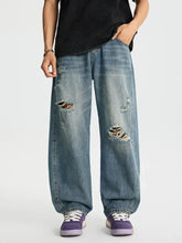 Men’s light-wash denim baggy jeans with distressed relaxed fit and wide-leg cut full size plus size