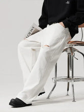 Men’s white distressed ripped wide leg jeans in full size with a relaxed fit for plus size wear