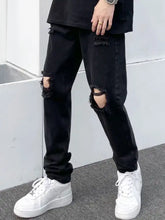 Men’s full size black distressed slim fit denim jeans with ripped knees and frayed edges in slim fit style
