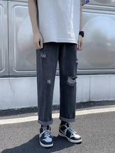 Men’s dark gray distressed straight-leg jeans with rolled cuffs in full size plus size denim material