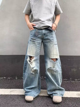 Men’s light-wash denim distressed wide-leg jeans with ripped knees and frayed edges plus size full size