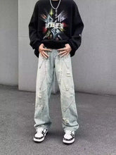 Men’s light-wash denim wide-leg jeans with distressed patches and geometric stitching plus size full size wide-leg jeans offer