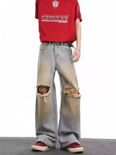 Men’s full size distressed wide leg jeans in light-wash denim with frayed knee holes and a faded worn look