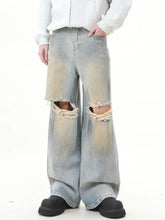 Men’s full size distressed light-wash denim wide leg jeans with frayed knee holes in plus size