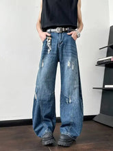 Men’s blue denim distressed wide leg jeans featuring full size plus size wide-leg jeans with distressed patches