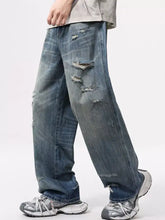 Men’s full size distressed blue denim wide leg jeans with ripped knees and frayed hems for plus size fit