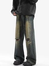 Men’s full size dark wash distressed wide leg jeans with intentional knee rips perfect for casual wear