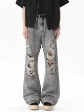 Men’s full size distressed gray denim wide leg jeans with ripped knees and frayed edges