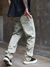 Men’s light green distressed wide leg jeans with faded paisley pattern and ripped details for perfect fit plus size