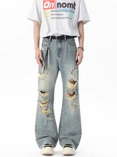 Men’s full size light-wash denim wide leg jeans with distressed ripped knees and frayed edges