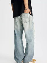 Men’s light-wash distressed wide leg jeans in full size plus with a wide leg cut and side seam detailing
