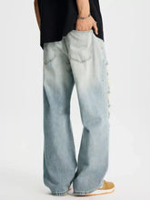 Men’s light-wash denim full size wide leg jeans with distressed detailing along the side seam in plus size